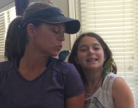 2 parakeets Blue and white (male) green and yellow (female)